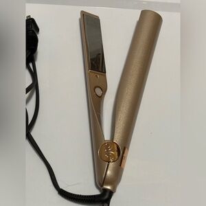 TYME Iron Pro 2-in-1 Hair Curler and Straightener in rose gold.